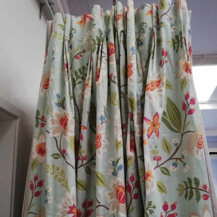 Pale green with large colourful flowers and leaves, lined. 3525.